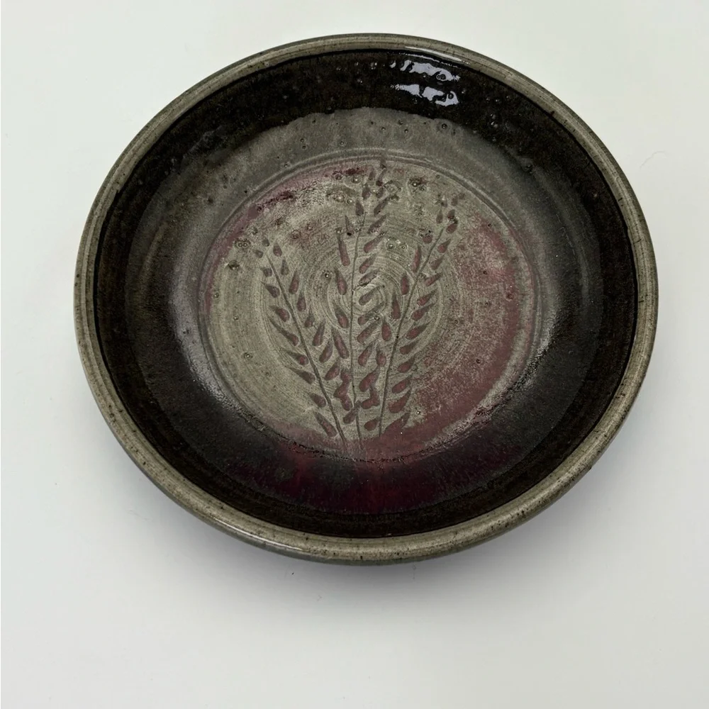Signed Handcrafted Pottery  Plate with Dark Red Wheat Design on Gray-Green